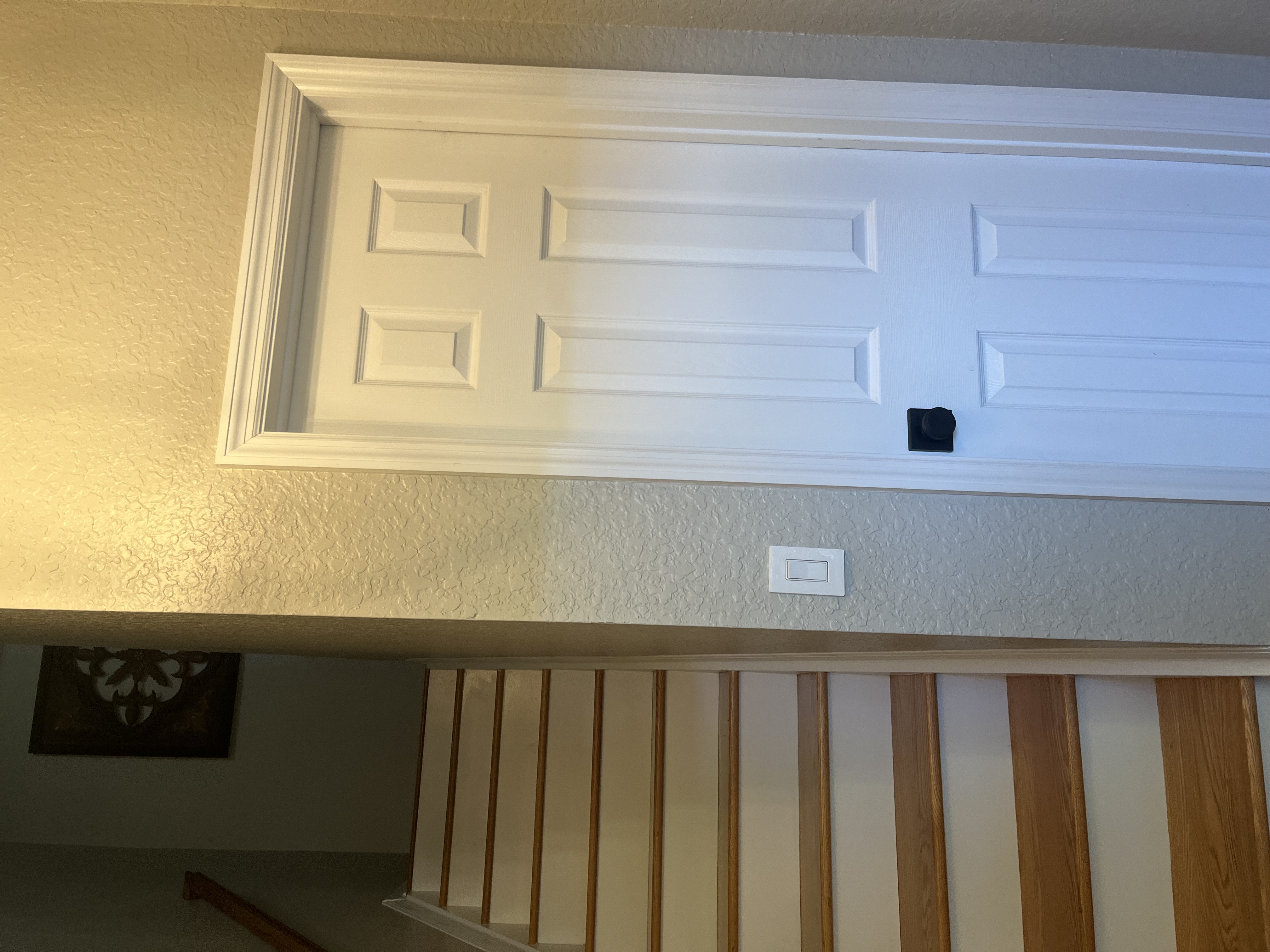 Stairwell project with trim and door framing more developed during installation